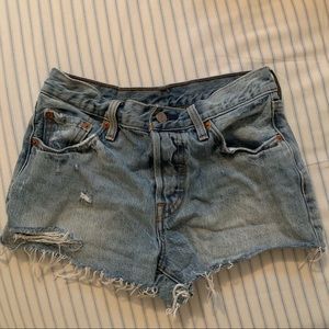 Levi’s light-washed ripped denim shorts
